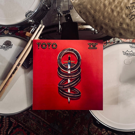 S08E01 - "Rosanna" by Toto